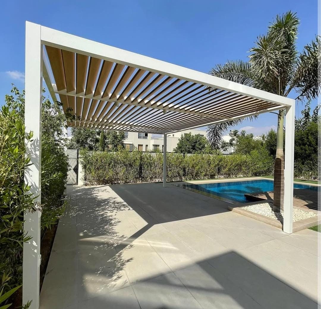 White-frame pergola over pool deck