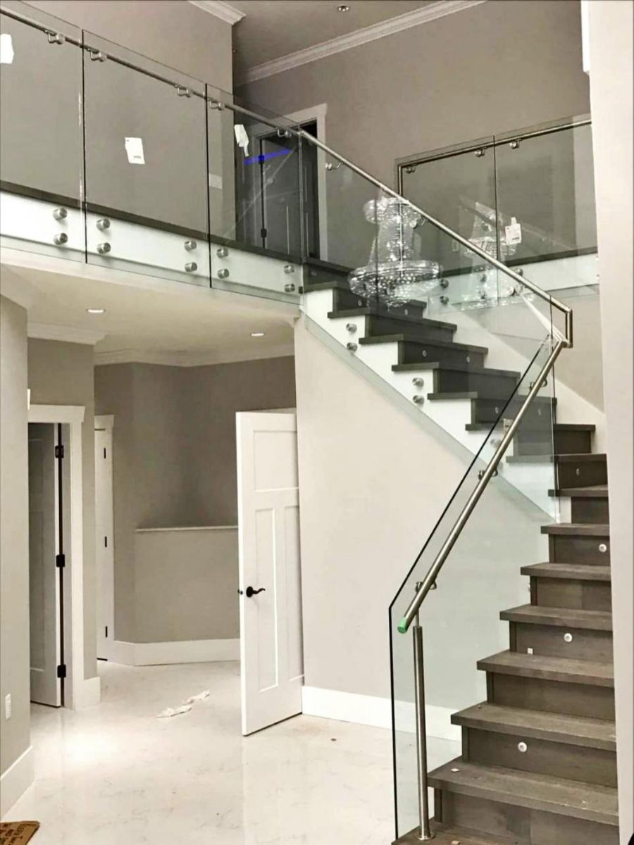 Frameless glass railing with stainless standoffs