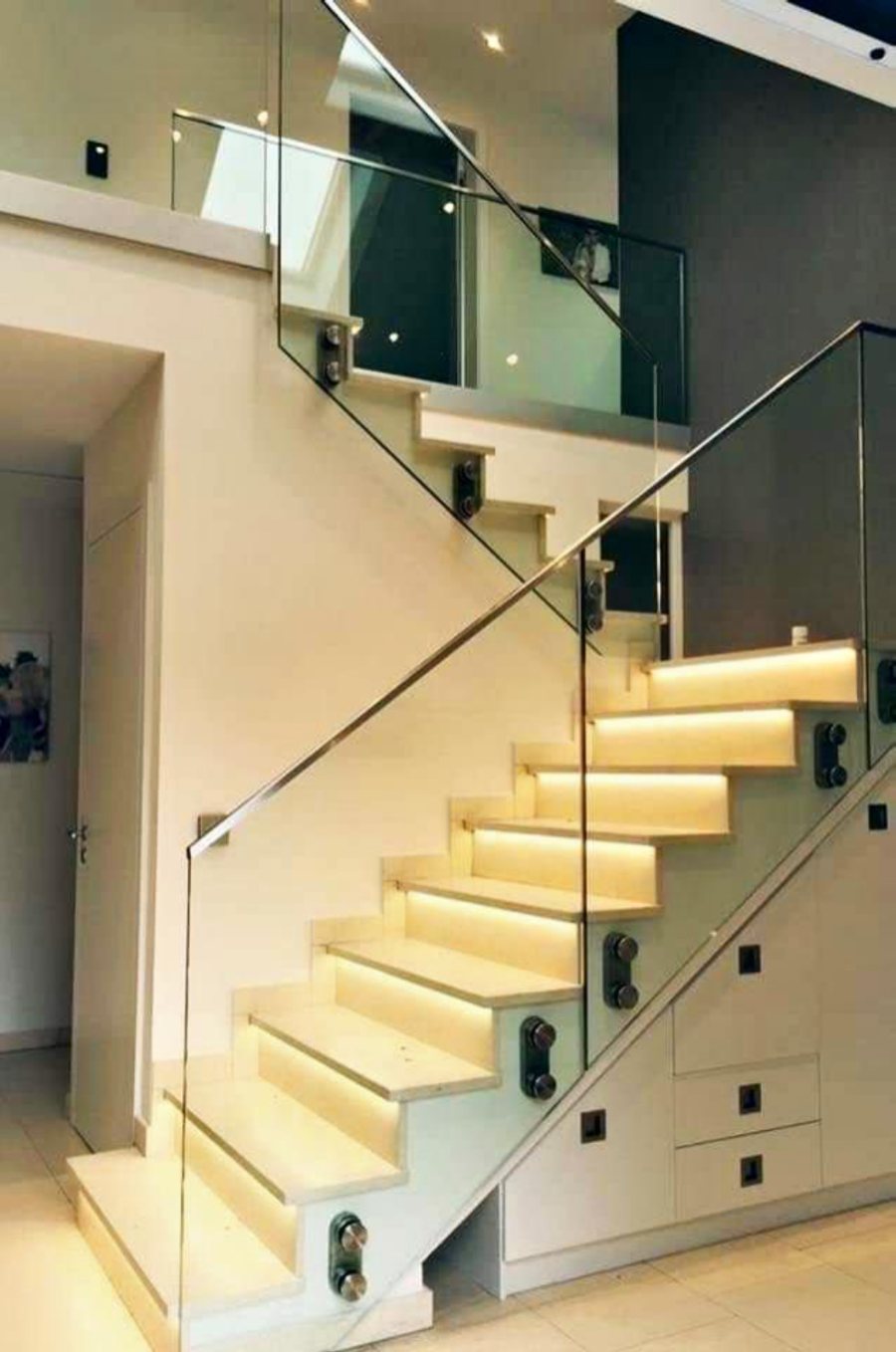 Glass balustrade, warm timber entry stair